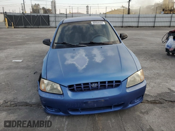 2001 Hyundai Accent GL with VIN KMHCG45C91U195735, listed as a Copart auction lot 80950554 with 164,176 mi miles and Salvage Title. Bid and sale history available at carsss.com. Image 5.