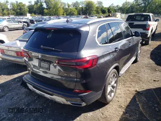 2020 BMW X5 xDrive40i with VIN 5UXCR6C05L9C58078, listed as a Copart auction lot 58996372 with 30,714 mi miles. Bid and sale history available at carsss.com. Image 4.