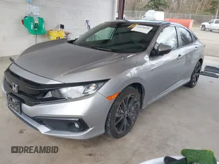 2021 Honda Civic Sport with VIN 2HGFC2F83MH521470, listed as a IAAI auction lot 41828890 with 49,703 mi miles and . Bid and sale history available at DreamBid. Image 17.