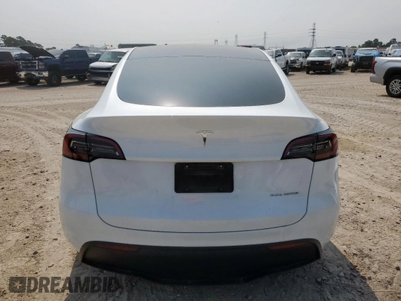 2024 Tesla Model Y Long Range с VIN 7SAYGDEE5RA261374, выставлен на аукционе Copart как лот 57666185 с пробегом 30 174 миль миль и Списание • Salvage title. История ставок и продаж доступна на DreamBid. Изображение 6.