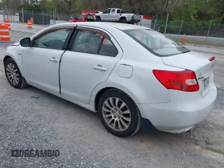 2010 Suzuki Kizashi SE with VIN JS2RE9A35A6101030, listed as a IAAI auction lot 42092865 with 245,675 mi miles and . Bid and sale history available at DreamBid. Image 3.