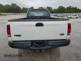 2002 Ford F-150 XL with VIN 1FTRF17W32NB86385, listed as a Copart auction lot 73276754 with 100,817 mi miles and Salvage Title. Bid and sale history available at carsss.com. Image 6.