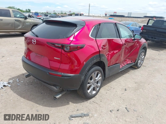 2021 Mazda CX-30 Preferred with VIN 3MVDMBCL6MM243479, listed as a IAAI auction lot 42226356 with 38,628 mi miles and . Bid and sale history available at DreamBid. Image 4.