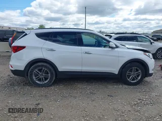 2018 Hyundai Santa Fe 2.4L z VIN 5NMZUDLB1JH101842, wystawiony jako IAAI lot #42302237 z przebiegiem 97 376 mil mil oraz . Historia ofert i sprzedaży dostępna na DreamBid. Obrazek 14.