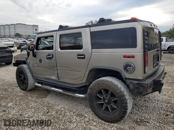 2006 Hummer H2 z VIN 5GRGN23U26H101561, wystawiony jako Copart lot #89308685 z przebiegiem 327 103 mil mil oraz Tytuł czysty. Historia ofert i sprzedaży dostępna na DreamBid. Obrazek 2.