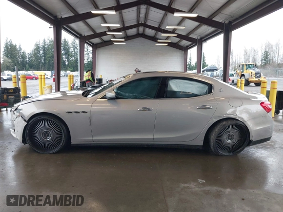2017 Maserati Ghibli with VIN ZAM57XSLXH1238134, listed as a IAAI auction lot 41871754 with 34,776 mi miles. Bid and sale history available at carsss.com. Image 13.