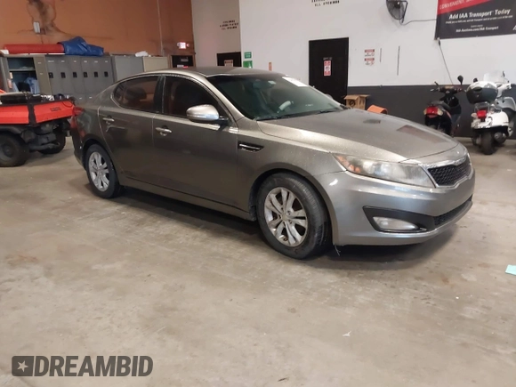 2013 Kia Optima EX with VIN 5XXGN4A74DG165525, listed as a IAAI auction lot 42405482 with 132,820 mi miles and . Bid and sale history available at DreamBid. Image 1.