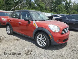2014 MINI Countryman with VIN WMWZB3C57EWR36323, listed as a Copart auction lot 55098765 with 124,849 mi miles and Non Repairable. Bid and sale history available at DreamBid. Image 4.