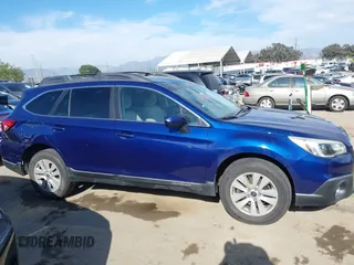 2015 Subaru Outback Premium with VIN 4S4BSBDC2F3290862, listed as a IAAI auction lot 42011007 with 152,628 mi miles and . Bid and sale history available at DreamBid. Image 13.