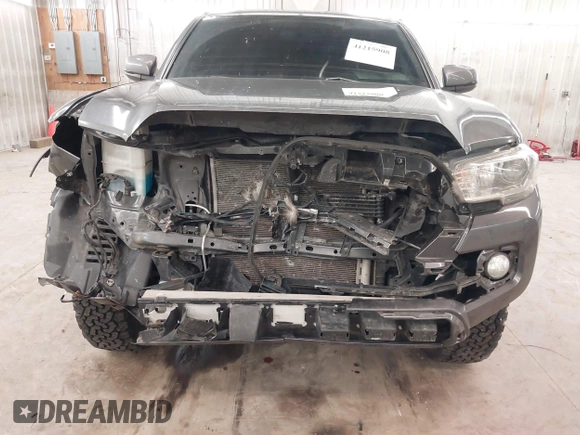 2016 Toyota Tacoma SR5 with VIN 3TMDZ5BN0GM012248, listed as a IAAI auction lot 41215908 with 170,756 mi miles and . Bid and sale history available at DreamBid. Image 6.