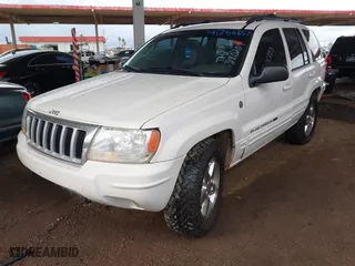 2004 Jeep Grand Cherokee Limited with VIN 1J8GW58N74C380204, listed as a IAAI auction lot 41756657 with 239,697 mi miles. Bid and sale history available at carsss.com. Image 2.