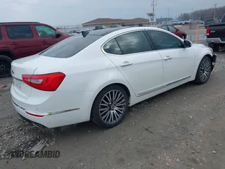 2014 Kia Cadenza Premium with VIN KNALN4D7XE5129562, listed as a IAAI auction lot 41922550 with 142,136 mi miles. Bid and sale history available at carsss.com. Image 4.