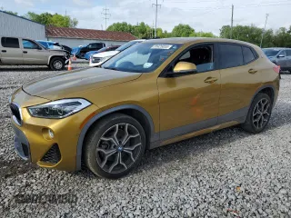 2020 BMW X2 xDrive28i z VIN WBXYJ1C00L5R17337, wystawiony jako Copart lot #55925855 z przebiegiem 84 758 mil mil oraz Szkoda całkowita • Salvage title. Historia ofert i sprzedaży dostępna na DreamBid. Obrazek 1.