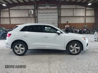 2020 Audi Q3 Premium with VIN WA1AECF3XL1090825, listed as a IAAI auction lot 42541577 with 32,432 mi miles and . Bid and sale history available at DreamBid. Image 13.