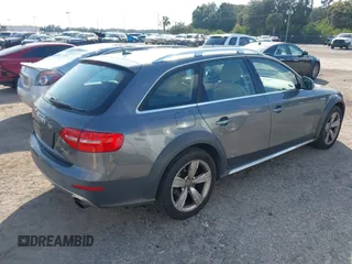 2014 Audi allroad Premium Plus with VIN WA1UFAFL7EA006011, listed as a IAAI auction lot 41494881 with 70,461 mi miles. Bid and sale history available at carsss.com. Image 4.