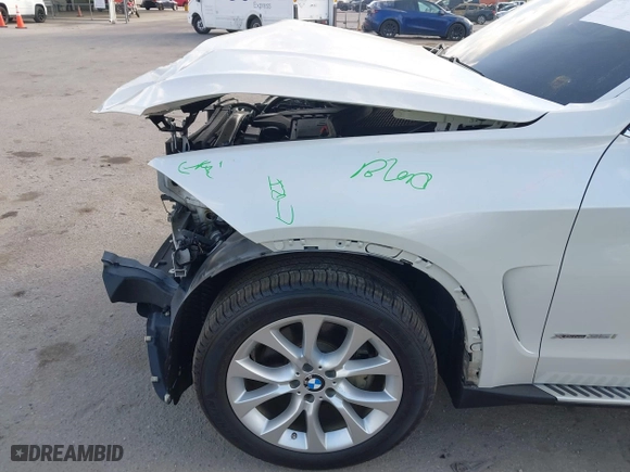 2016 BMW X5 xDrive35i with VIN 5UXKR0C54G0P27141, listed as a IAAI auction lot 41553602 with 61,947 mi miles. Bid and sale history available at carsss.com. Image 6.