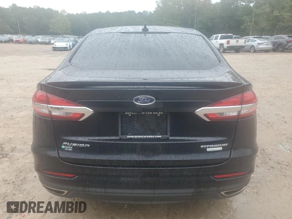 2019 Ford Fusion Titanium with VIN 3FA6P0K9XKR217324, listed as a Copart auction lot 56104185 with 135,728 mi miles and Salvage title. Bid and sale history available at DreamBid. Image 6.