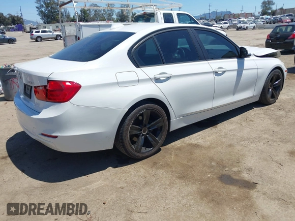 2014 BMW 3 Series 328i with VIN WBA3A5G55ENP31569, listed as a IAAI auction lot 42218428 with 151,927 mi miles and . Bid and sale history available at DreamBid. Image 4.