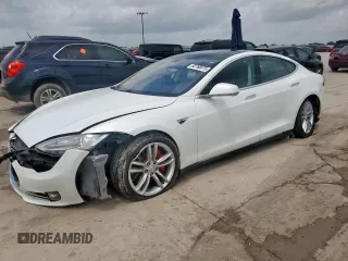 2014 Tesla Model S 60 с VIN 5YJSA1H10EFP43839, выставлен на аукционе Copart как лот 60768075 с пробегом 102 701 миль миль и Списание • Salvage title. История ставок и продаж доступна на DreamBid. Изображение 1.