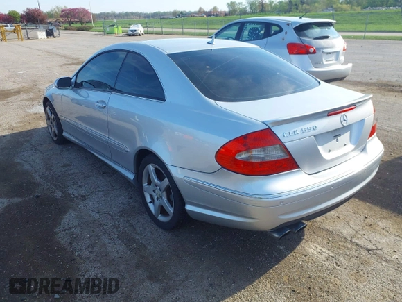 2007 Mercedes-Benz CLK-Class 5.5L with VIN WDBTJ72H97F209555, listed as a IAAI auction lot 42081006 with 137,436 mi miles. Bid and sale history available at carsss.com. Image 3.