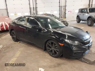 2019 Honda Civic Sport with VIN 19XFC2F89KE206213, listed as a IAAI auction lot 41804863 with 76,052 mi miles and . Bid and sale history available at DreamBid. Image 1.