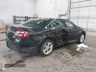 2015 Ford Taurus SEL with VIN 1FAHP2E81FG181897, listed as a IAAI auction lot 41598004 with Not Provided miles and . Bid and sale history available at carsss.com. Image 4.