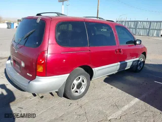 1999 Nissan Quest GXE with VIN 4N2XN11TXXD838700, listed as a IAAI auction lot 41867853 with 173,909 mi miles. Bid and sale history available at carsss.com. Image 4.