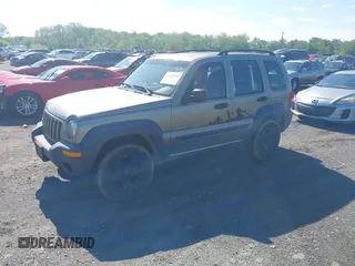 2003 Jeep Liberty Sport z VIN 1J4GL48K73W671700, wystawiony jako IAAI lot #42222189 z przebiegiem 237 970 mil mil oraz . Historia ofert i sprzedaży dostępna na DreamBid. Obrazek 2.