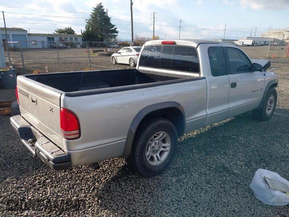 2002 Dodge Dakota with VIN 1B7GL12X42S698285, listed as a IAAI auction lot 40826030 with 211,936 mi miles and . Bid and sale history available at carsss.com. Image 4.