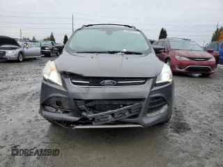 2015 Ford Escape Titanium with VIN 1FMCU9J92FUA62323, listed as a Copart auction lot 85826724 with 108,315 mi miles and Salvage Title. Bid and sale history available at carsss.com. Image 5.