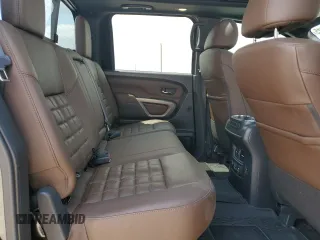 2023 Nissan Titan Platinum Reserve with VIN 1N6AA1EDXPN106467, listed as a Copart auction lot 53455215 with 56,061 mi miles and Salvage title. Bid and sale history available at DreamBid. Image 11.