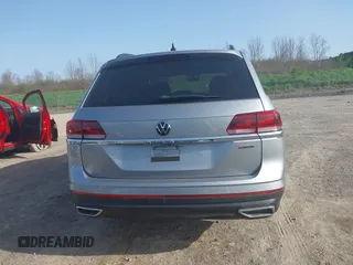 2021 Volkswagen Atlas SE z VIN 1V2LP2CA1MC538847, wystawiony jako IAAI lot #42134093 z przebiegiem 66 678 mil mil oraz . Historia ofert i sprzedaży dostępna na DreamBid. Obrazek 16.