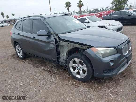 2013 BMW X1 28i with VIN WBAVM1C51DVW42577, listed as a IAAI auction lot 42029627 with 140,343 mi miles. Bid and sale history available at carsss.com. Image 1.