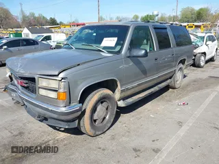 1999 GMC Suburban with VIN 3GKFK16R4XG514928, listed as a IAAI auction lot 41934636 with 245,010 mi miles and . Bid and sale history available at DreamBid. Image 17.