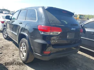 2017 Jeep Grand Cherokee Laredo with VIN 1C4RJFAG5HC793244, listed as a IAAI auction lot 41904575 with 299,722 mi miles. Bid and sale history available at carsss.com. Image 3.