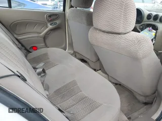2005 Pontiac Grand Am SE with VIN 1G2NE52E85M247297, listed as a IAAI auction lot 41701641 with 147,907 mi miles. Bid and sale history available at carsss.com. Image 8.