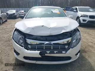 2010 Ford Fusion Hybrid with VIN 3FADP0L33AR392806, listed as a IAAI auction lot 41811194 with 131,627 mi miles. Bid and sale history available at carsss.com. Image 6.