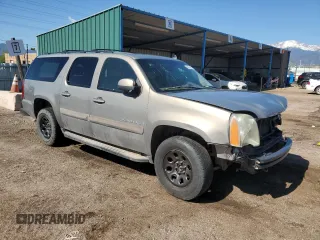2007 GMC Yukon XL SLT z VIN 1GKFK16317J183090, wystawiony jako Copart lot #56801965 z przebiegiem 175 818 mil mil oraz Czysty tytuł • Clean title. Historia ofert i sprzedaży dostępna na DreamBid. Obrazek 4.