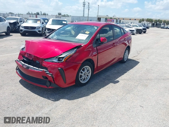 2021 Toyota Prius L Eco with VIN JTDKAMFU4M3145215, listed as a IAAI auction lot 42281566 with 74,220 mi miles and . Bid and sale history available at DreamBid. Image 2.