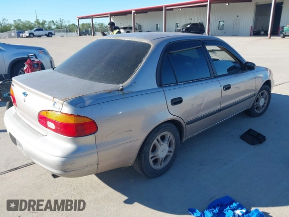 2001 Chevrolet Prizm with VIN 1Y1SK54811Z411948, listed as a IAAI auction lot 40874344 with 1 mi miles. Bid and sale history available at carsss.com. Image 4.