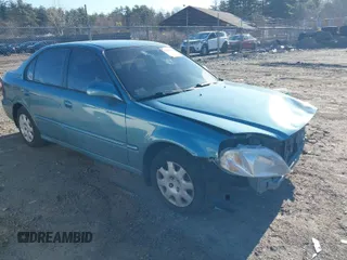 1999 Honda Civic DX with VIN 2HGEJ662XXH504884, listed as a IAAI auction lot 41894914 with 114,888 mi miles. Bid and sale history available at carsss.com. Image 1.