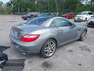 2015 Mercedes-Benz SLK 250 z VIN WDDPK4HA2FF099896, wystawiony jako IAAI lot #42333660 z przebiegiem 58 892 mil mil oraz . Historia ofert i sprzedaży dostępna na DreamBid. Obrazek 4.