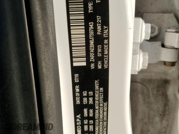 2018 Alfa Romeo Giulia z VIN ZARFAEBN6J7597943, wystawiony jako Copart lot #88288745 z przebiegiem 105 551 mil mil oraz Szkoda całkowita • Salvage title. Historia ofert i sprzedaży dostępna na DreamBid. Obrazek 14.