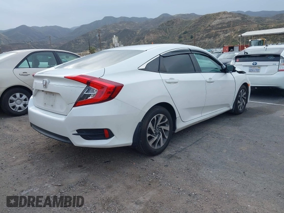 2016 Honda Civic Sedan EX with VIN 2HGFC2F70GH530459, listed as a IAAI auction lot 41710538 with 136,470 mi miles. Bid and sale history available at carsss.com. Image 4.