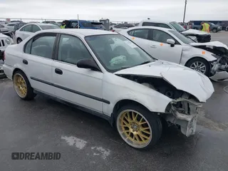 1997 Honda Civic LX z VIN 2HGEJ6676VH534795, wystawiony jako IAAI lot #42170378 z przebiegiem 228 033 mil mil oraz . Historia ofert i sprzedaży dostępna na DreamBid. Obrazek 1.