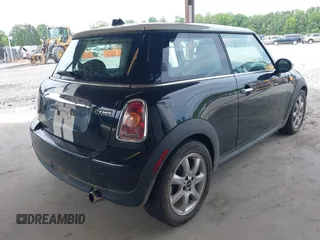 2010 MINI Hardtop with VIN WMWMF3C50ATZ26663, listed as a IAAI auction lot 42137470 with 106,894 mi miles and . Bid and sale history available at DreamBid. Image 4.