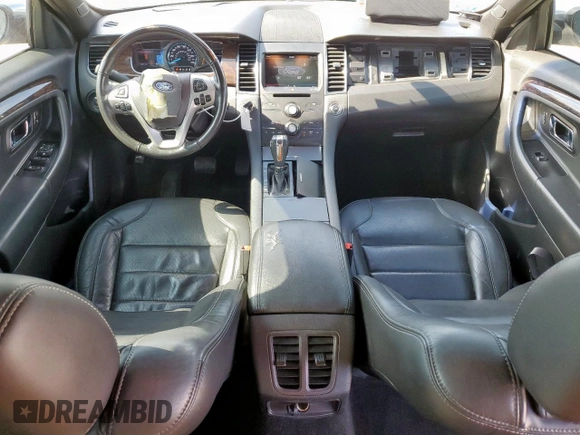 2013 Ford Taurus Limited with VIN 1FAHP2F84DG129904, listed as a Copart auction lot 58218205 with 105,877 mi miles and Salvage title. Bid and sale history available at DreamBid. Image 8.