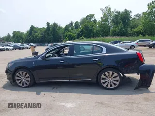 2013 Lincoln MKS EcoBoost with VIN 1LNHL9FT3DG602190, listed as a IAAI auction lot 42483472 with 63,238 mi miles and . Bid and sale history available at DreamBid. Image 14.