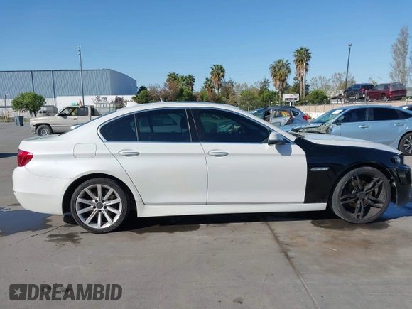 2015 BMW 5 Series 528i with VIN WBA5A5C59FD524043, listed as a IAAI auction lot 42023892 with 94,216 mi miles and . Bid and sale history available at carsss.com. Image 13.