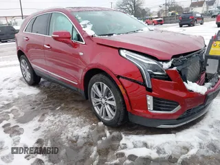 2023 Cadillac XT5 AWD Premium Luxury with VIN 1GYKNDRS6PZ111495, listed as a IAAI auction lot 41185409 with 15,555 mi miles and . Bid and sale history available at DreamBid. Image 1.
